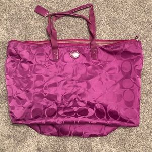 Pink coach weekender bag